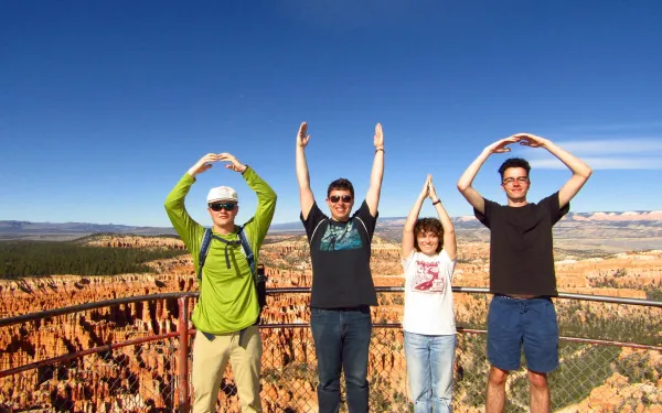 four students spelling Ohio standing in Bryce Canyon National Park 
